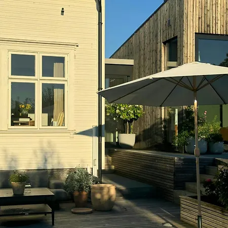 Family With Swimming Pool In