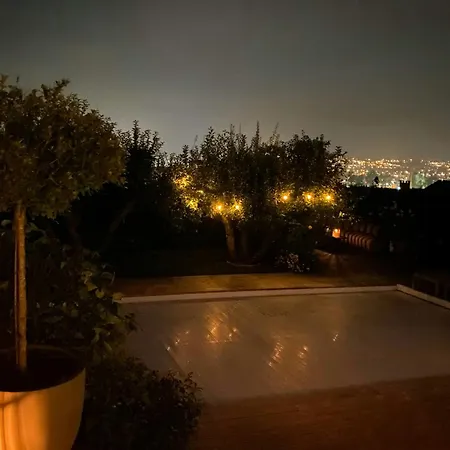 Family With Swimming Pool In